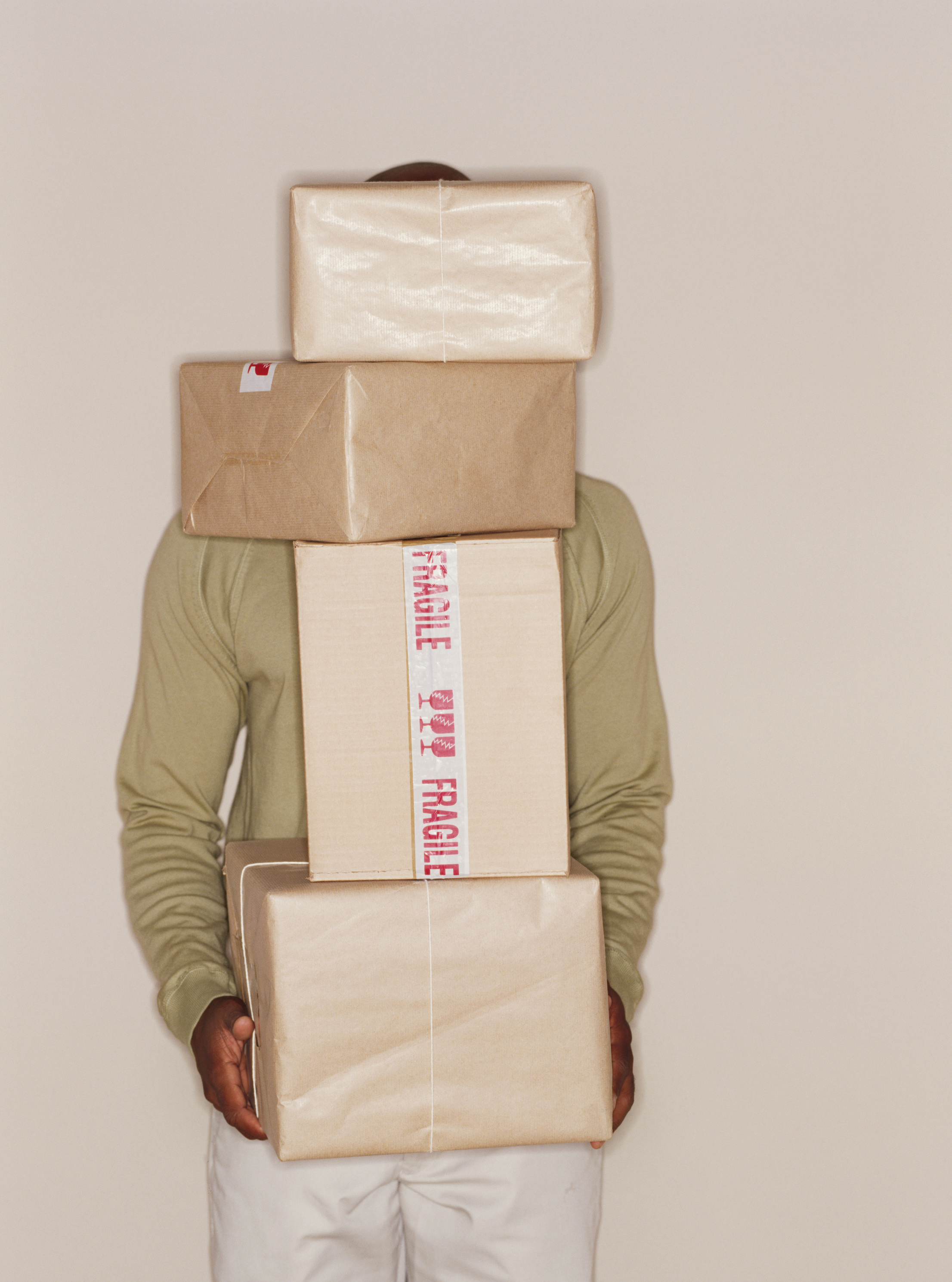 man holding packages
